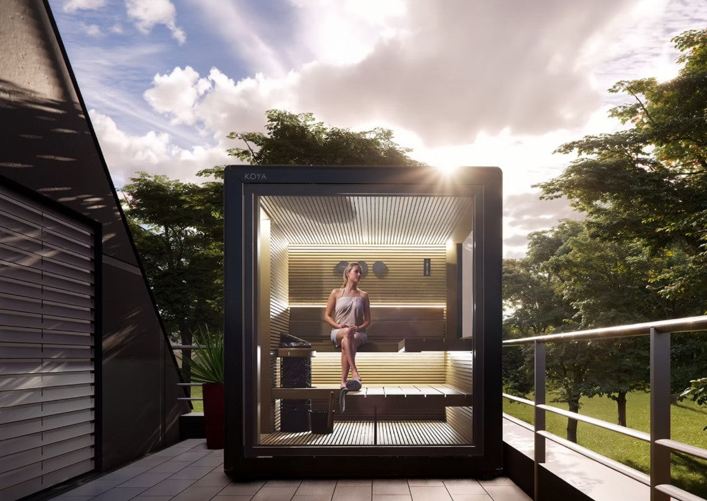 Portable Koya Modern Cube Outdoor Traditional Sauna with a person inside